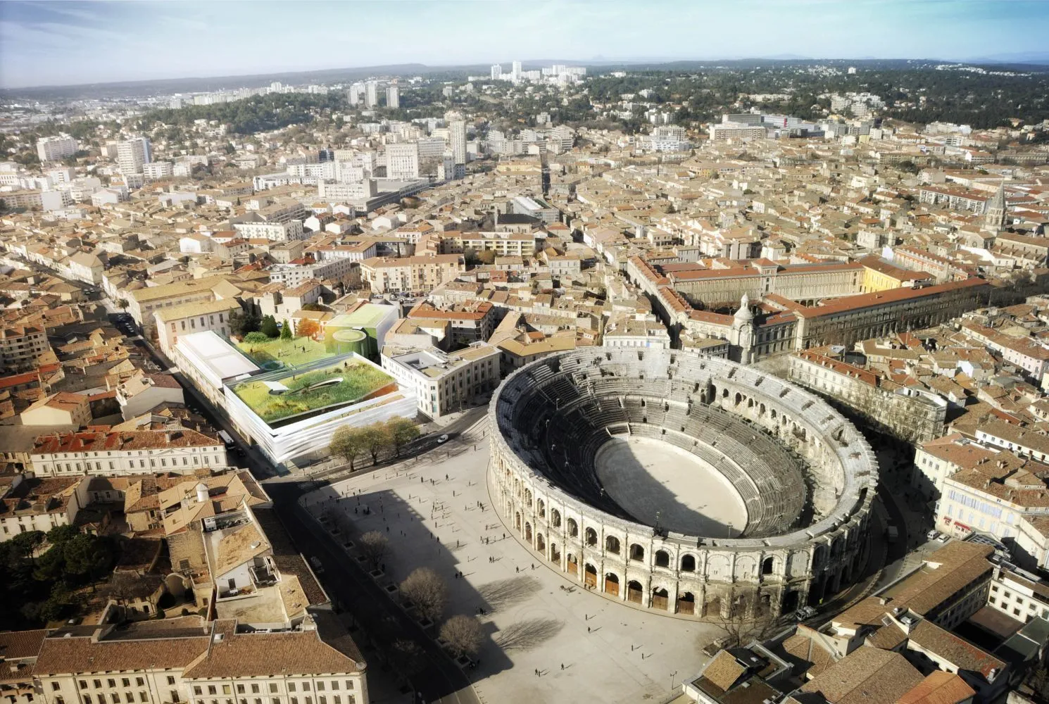 Vue aérienne de Nîmes avec les Arènes et le Musée de la Romanitée.